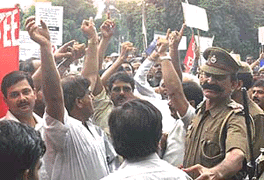 Employees of News-agencies and Newspapers demonstrating near Parliament House in New Delhi on Tuesday demanding recommendations of Manisana Wage Board