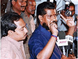 Emissary R.R. Gopal, who returned from forests after eight days of negotiations with forest brigand Veerappan, talking to reporters at tamil Nadu Chief Minister's residence in Chennai on Thursday