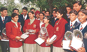 NCC cadets from Haryana, who had participated in the Republic Day Camp-2000, in a joyous mood after being honoured by the Haryana Governor, Babu Parmanand, at Haryana Raj Bhavan in Chandigarh on Friday