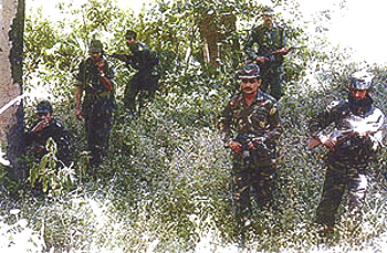 Indian army soldiers stand guard at the Line of Control  seperating Indian and Pakistan on Friday in Jammu, after Pakistani troops attacked a frontier outpost in the disputed state of Kashmir. At least 12 Pakistani soldiers and an Indian trooper died in the attack