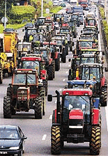 French farmers block a route near Strasbourg during a demonstration on Friday. The farmers are protesting against increases in fuel prices which have almost tripled this year