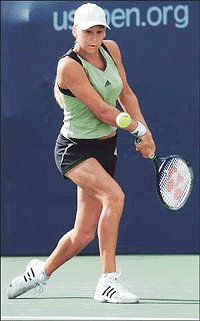 Anna Kournikova of Russia hits a return during her match with Sandra Kleinova of the Czech Republic at the U.S. Open in New York, on Thursday