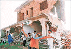 Debris being removed after the enforcement wing of PUDA demolished unauthorised structures in Jujhhar