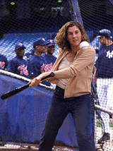 Monica Seles eyes a baseball at New York�s Yankee Stadium where she went to meet some of the players and try her hand at baseball on Friday.