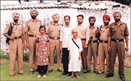 A team of Haibowal police and DSP Harmanbir Singh Gill with the two children Manisha and Himmat Kumar.