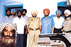 The Dehlon police along with the seized weapons and accused Gurdeep Singh (inset) in Ludhiana.