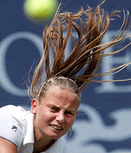 Jelena Dokic of Australia serves to Serena Williams of the USA during their match at the US Open in New York on Monday. 