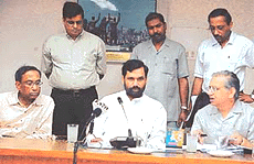 Union Communication Minister Ram Vilas Paswan seeks queries from postal and telecommunication officers at a press conference in Ludhiana on Sunday. 