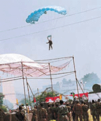 A paratrooper about to land at the Sector 5 cricket ground.