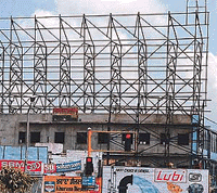 Ugly looking iron structures with small advertisement boards under these stand in violation of the Punjab Haryana High Court orders. 