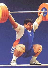Iran�s Hossein Rezazadeh lifts a new world record of 212.5 kg in the snatch of the men�s over 105 kg division at the Sydney Olympic Games on Tuesday.  