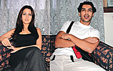Models Ria Sen and John Abraham in Ludhiana on Tuesday. 