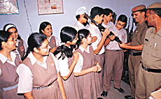Students of Hansraj Public School, Sector 6, get hands-on training during an interactive session between students and the police in the police station.