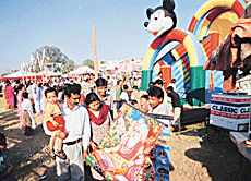 A man sells posters of Maharshi Valmiki in the mela held on the occasion of Maharshi Valmiki Pargat Divas in Sector 23, CHD.