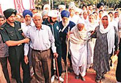 Some of the widows and parents of soldiers killed in war, at Chandi Mandir.