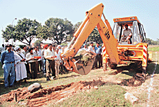 Bulldozers start work on the Chandigarh-Ludhiana rail link in Chandigarh on Tuesday.