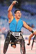 Jung-Hoon Moon from South Korea celebrates as he wins the 400-metre wheelchair final at the 11th Paralympic Games in Sydney on Friday. � AP/PTI