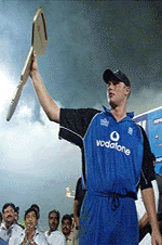 England cricket player Andrew Flintoff waves a car key he won as the 'man of the match' award in Karachi on Tuesday. Flintoff destroyed Pakistan with 59-ball 84 to steer England to historic five-wicket victory in a high-scoring first one-day international on Tuesday. England won by five wickets with 16 balls to spare.
