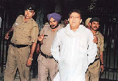 Former Test cricketer Yograj Singh surrenders in the District Courts, Chandigarh.
