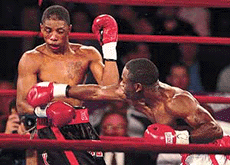 Rohnique Posey (left) dodges a punch from richard Lee Hall during their welterweight bout on Saturday at The Theater at Madison Square Garden in New York. Hall won the bout.