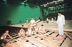 The delay in replacing wooden portion of the badminton court in the Sector 42 indoor hall has hampered the training schedule of players. 