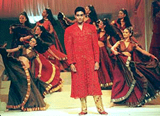 Filmstar Abhishek Bachchan, son of superstar Amitabh Bachchan models an embroidered designer outfit during a fashion show in Mumbai on Friday. The show which was attended by industrialists and celebrities was organised to raise money for an AIDS fund