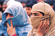 Kashmiri women attend a rally in Srinagar which was addressed by Mr G.M. Shah, former Chief Minister of Jammu and Kashmir, called for a peaceful settlement of the Kashmir issue.