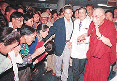 Tibetans seek blessings from the Dalai Lama in the PGI, Chandigarh, on Sunday.