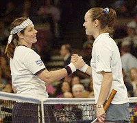 Martina Hingis (right) is congratulated by Nathalie Tauziat after Hingis' 6-1,6-7, 6-2 victory in the Chase Championships quarterfinals match on Thursday at Madison Square Garden in New York.