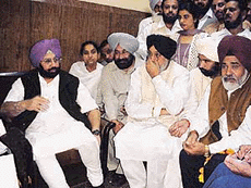 PCC president Amarinder Singh talks to reporters at Ludhiana railway station on Sunday. On his left are Mr Nahar Singh Gill and the local MP, Mr Gurcharan Singh Ghalib.