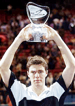 Russia's Marat Safin holds the trophy after defeating Australia's Mark Philippoussis 3-7, 7-6, 6-4, 3-6, 7-6 during the Paris men's Indoors Tennis Master Series final at the Bercy Stadium in Paris on Sunday .