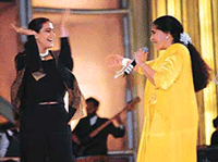 Actress Kajol dances with Asha Bhosle at the �Kal Aaj aur Hamesha� show in Mumbai on Saturday night. 