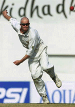 Zimbabwean spinner Grant Flower bowls on the second day of the second Test between India and Zimbabwe in Nagpur on Sunday. Zimbabwe were 59 for the loss of one wicket in reply to India's first innings score of 609 for six declared.