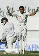 Indian bowler Ajit Agarkar celebrates getting batsman Andy Flower out on the third day of the second Test between India and Zimbabwe in Nagpur on Monday.