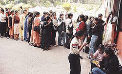 A long line of Government College girls waiting to pay their college fees.
