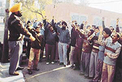 Striking PSEB employees hold a rally in Ludhiana.