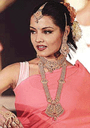 Model displays jewellery.