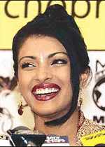 Newly crowned Miss World 2000, Priyanka Chopra, smiles during her first news conference in New Delhi on Monday.