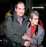 Edmond Pope (54) of Grants Pass is embraced by his mother, Elizabeth, as he arrives on Sunday night at the Portland International Airport.