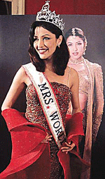 Aditi Govitrikar, who won the Mrs World contest held in Las Vegas earlier this month, addresses a news conference in Bombay on Wednesday.