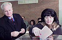 Former Yugoslav President Slobodan Milosevic .
