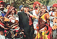 The Punjab Governor, Lieut-Gen J.F.R. Jacob (retd), enjoys dholamaru dance of Rajasthan after the inauguration of Chandigarh Carnival in Leisure Valley, Sector 10, on Saturday.