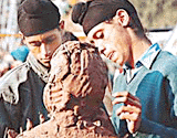 Boys give shape to clay at Chandigarh Carnival in Sector 10 on Sunday.