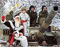 Father Frost (left) and Snegurochka (Snowmaiden) sit on a tank during a rehearsal of the New Year's celebration at an elite Kantemirovskaya tank division outside Moscow on Saturday. 