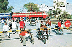 Showing scant regard for safety norms, a large number of persons cross this level crossing in the heart of Ambala City everyday.