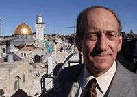 Jerusalem Mayor Ehud Olmert stands in front of the Dome of the Rock in the Old City of Jerusalem on Thursday 