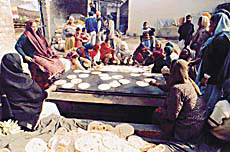 Devotees prepare langar at the Gurdwara Dukhniwaran Sahib, Field Ganj, Ludhiana, on Tuesday.