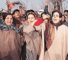 Relatives mourn the death of Ghulam Rasool Dar at Beerua, 30 km west of Sri - nagar, on Wednesday.