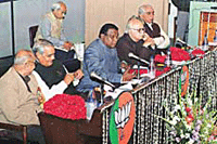 Prime Minister Atal Behari Vajpayee flanked by BJP President Bangaru Laxman and his predecessor Kusha Bhau Thakre at the BJP National Executive meeting at Parliament annexe in New Delhi on Thursday.