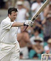Australia's captain Steve Waugh acknowledges the crowd after making his century.